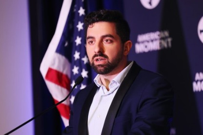 Ryan Girdusky speaking at a podium